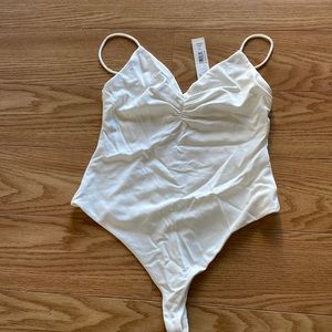 Alice + Olivia by Stacey Bendet white bodysuit. Brand new never worn with tags